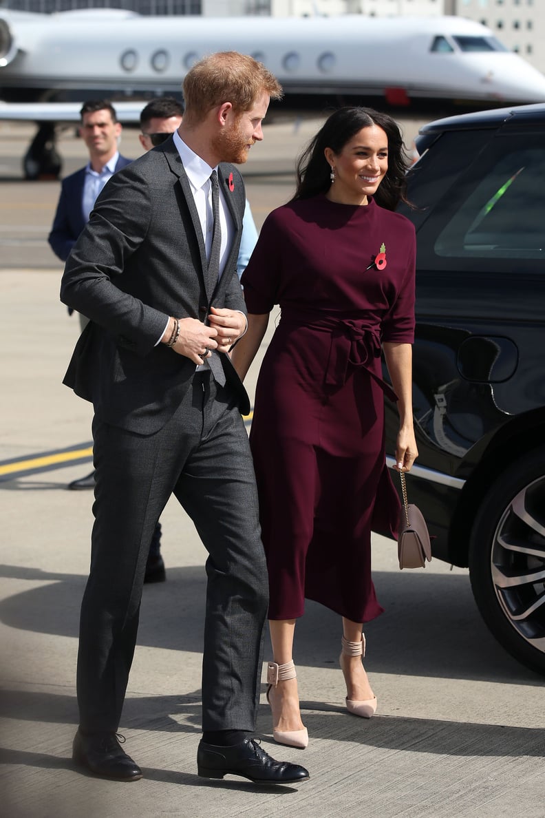 Meghan Wore a Boss by Hugo Boss Dress With a Cuyana Bag and Aquazzura Pumps When She Headed From Australia to New Zealand