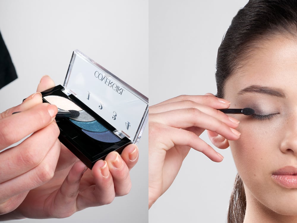 Adding complementary eye shadow to the lids will soften the look, while still emphasizing the eyes, and make it more wearable for daytime. Using a palette with premium, buildable pigments, start by applying the darkest shade onto the outer corner of your lid. Working your way inward, blend the lighter, silvery shade onto the center, and finish with the lightest cream shade on the inner corners.