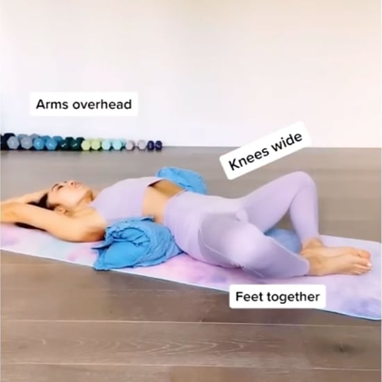 Blogilates Stretches to Relieve Period Cramps Using a Pillow