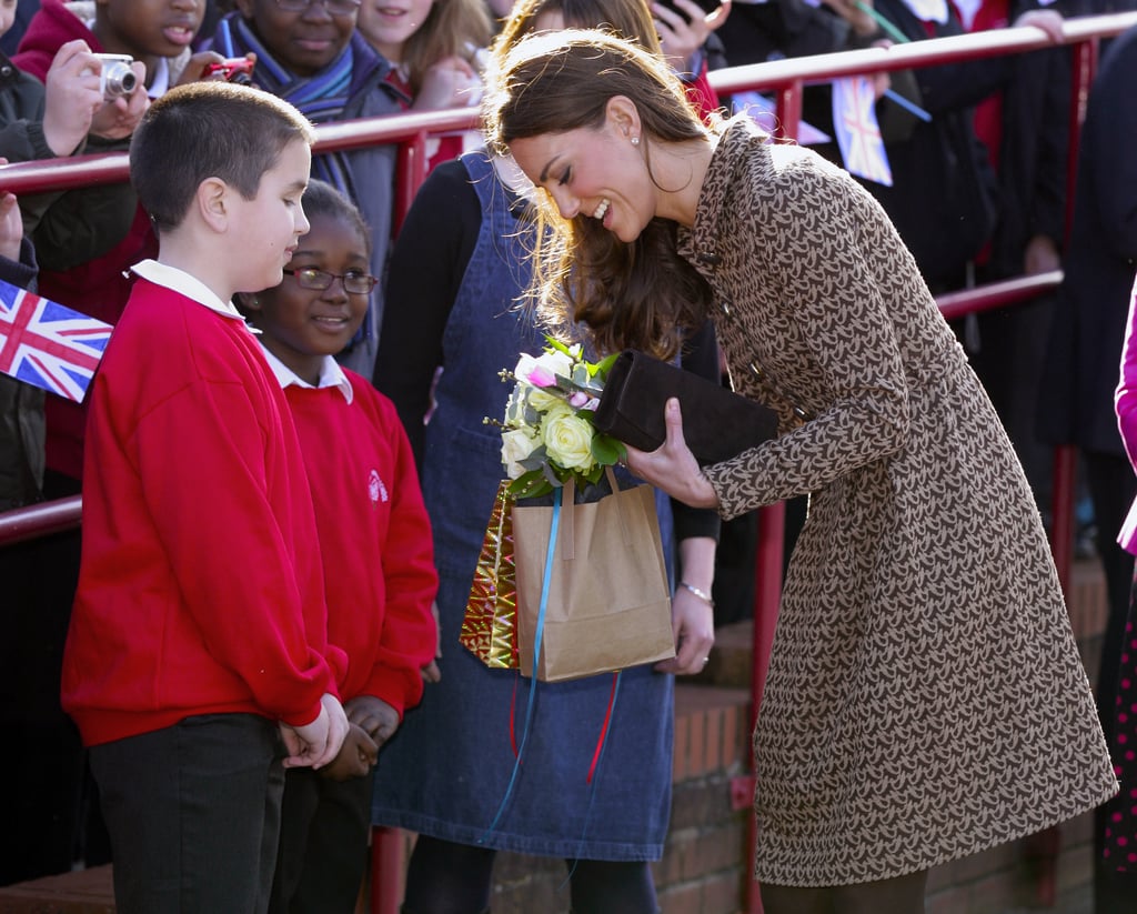 Kate talked to a pair of cute schoolboys as she arrived for a visit to England's Rose Hill Primary School in February 2012.