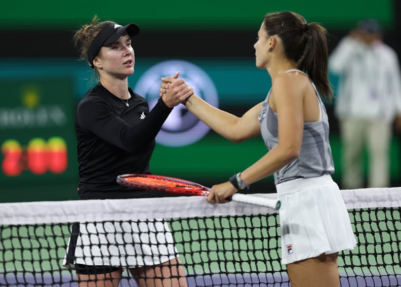INDIAN WELLS, CALIFORNIA - MARCH 11:  Emma Navarro of the United States shakes hands at the net after her three set victory against Elina Svitolina of the Ukraine in their third round match during the BNP Paribas Open at Indian Wells Tennis Garden on Marc