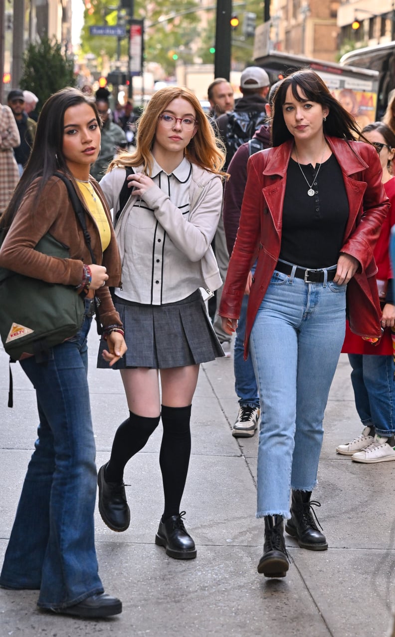NEW YORK, NEW YORK - OCTOBER 11: Isabela Merced, Sydney Sweeney and Dakota Johnson are seen on the set of 