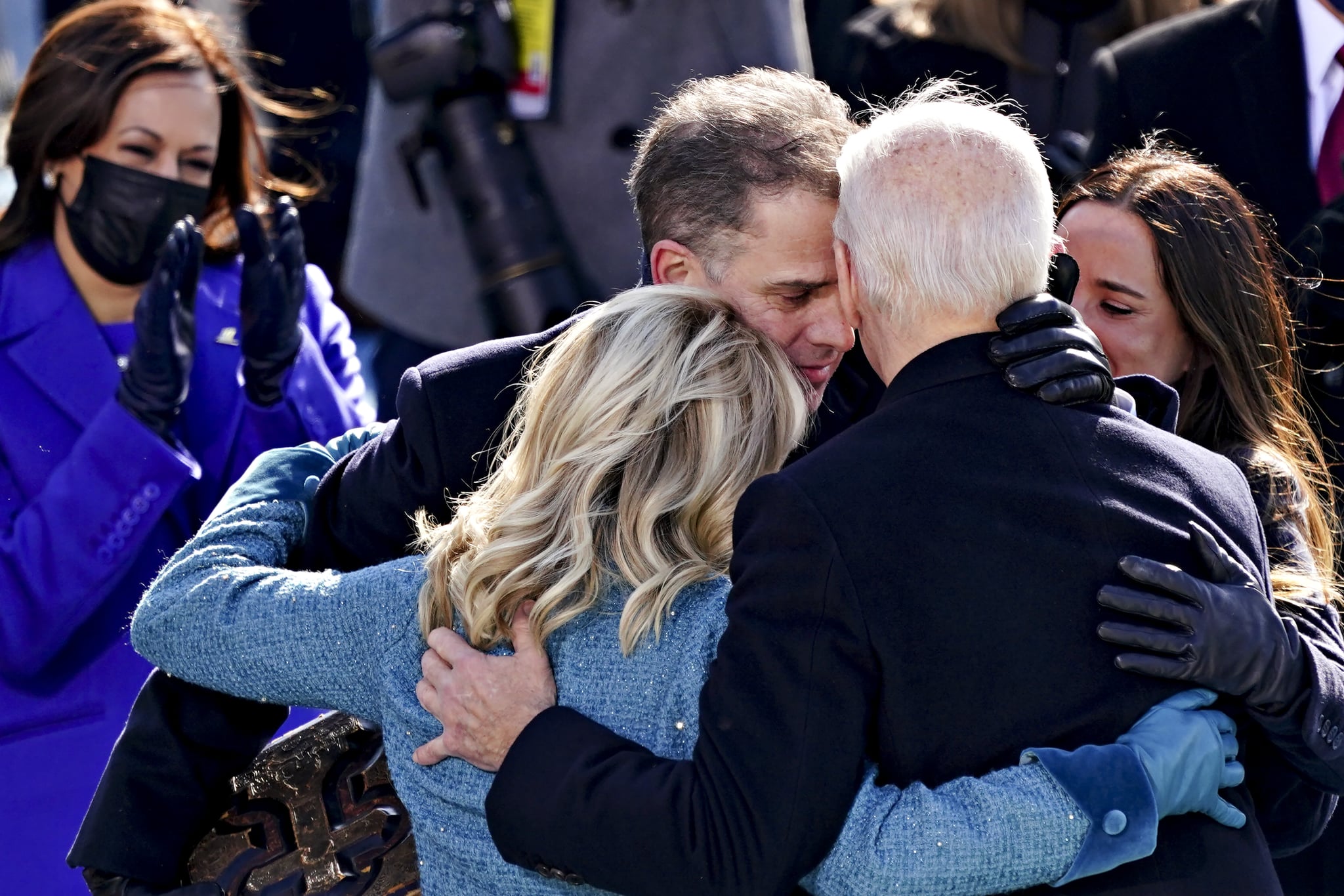 TOPSHOT - US President Joe Biden(R) is comforted by his son Hunter Biden and First Lady Jill Biden after being sworn in during the 59th presidential inauguration in Washington, DC on the West Front of the US Capitol on January 20, 2021 in Washington, DC. - During today's inauguration ceremony Joe Biden became the 46th president of the United States. (Photo by Kevin Dietsch / POOL / AFP) (Photo by KEVIN DIETSCH/POOL/AFP via Getty Images)