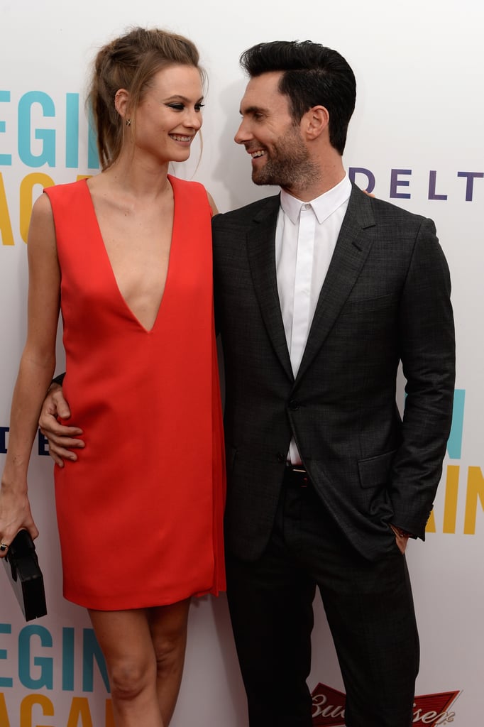 Adam Levine and his fiancée, Behati Prinsloo, shared a sweet moment at his Begin Again premiere in NYC on Wednesday.