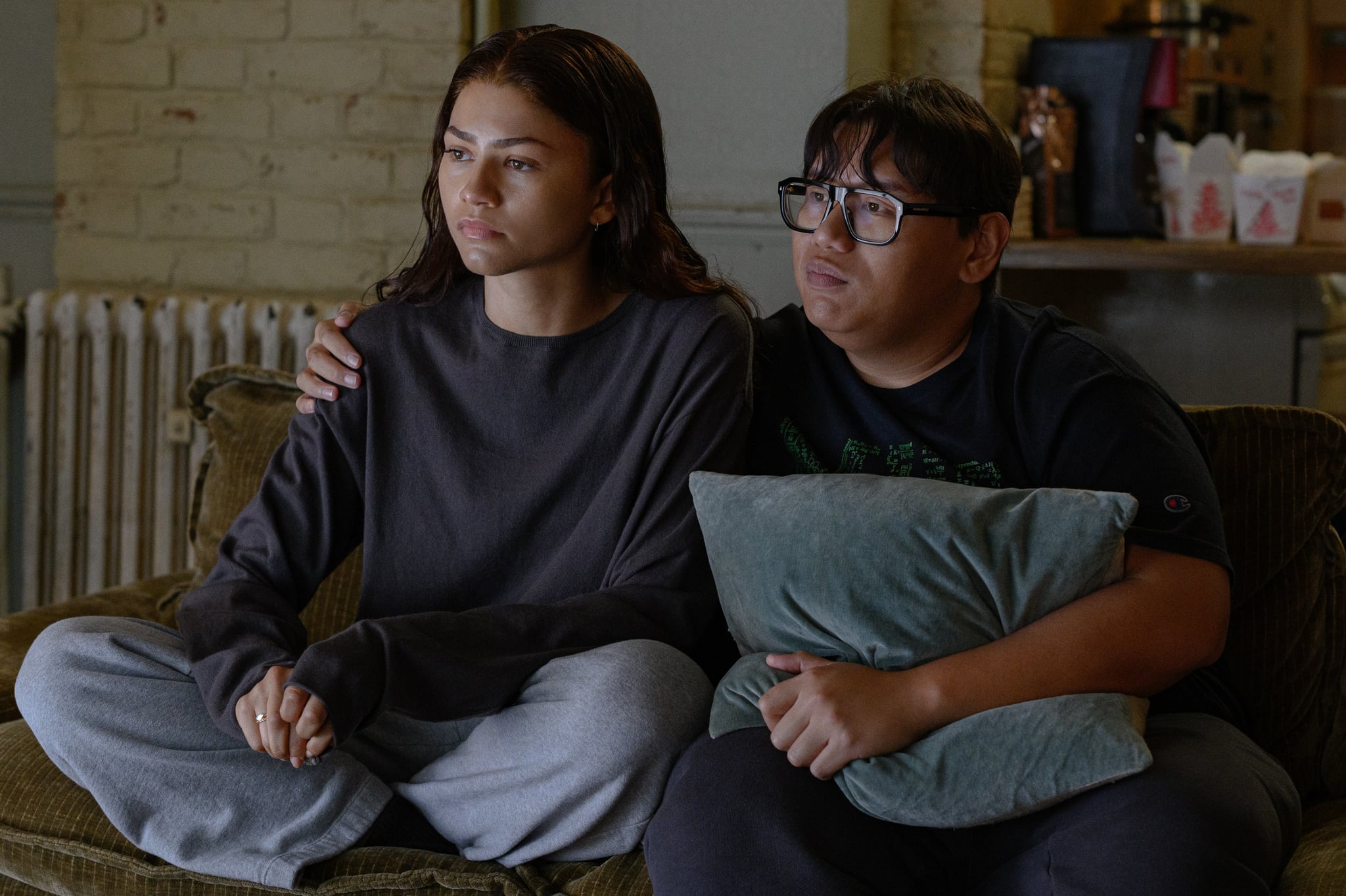 MJ (Zendaya) and Ned (Jacob Batalon) watch the news in Columbia Pictures SPIDER-MAN™: BRAND NEW DAY.  Photo by: Jay Maidment