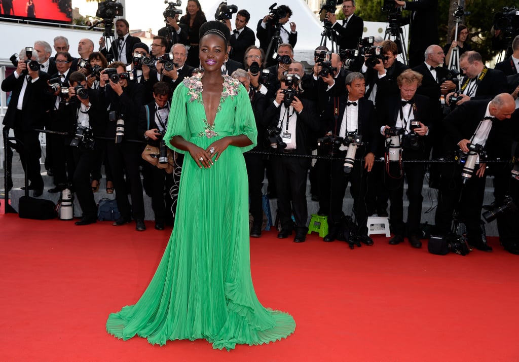 Lupita took to Instagram to kick off her Cannes evening in #GrasshopperGreen, thanking Gucci for the custom design and Chopard for the lovely jewels.