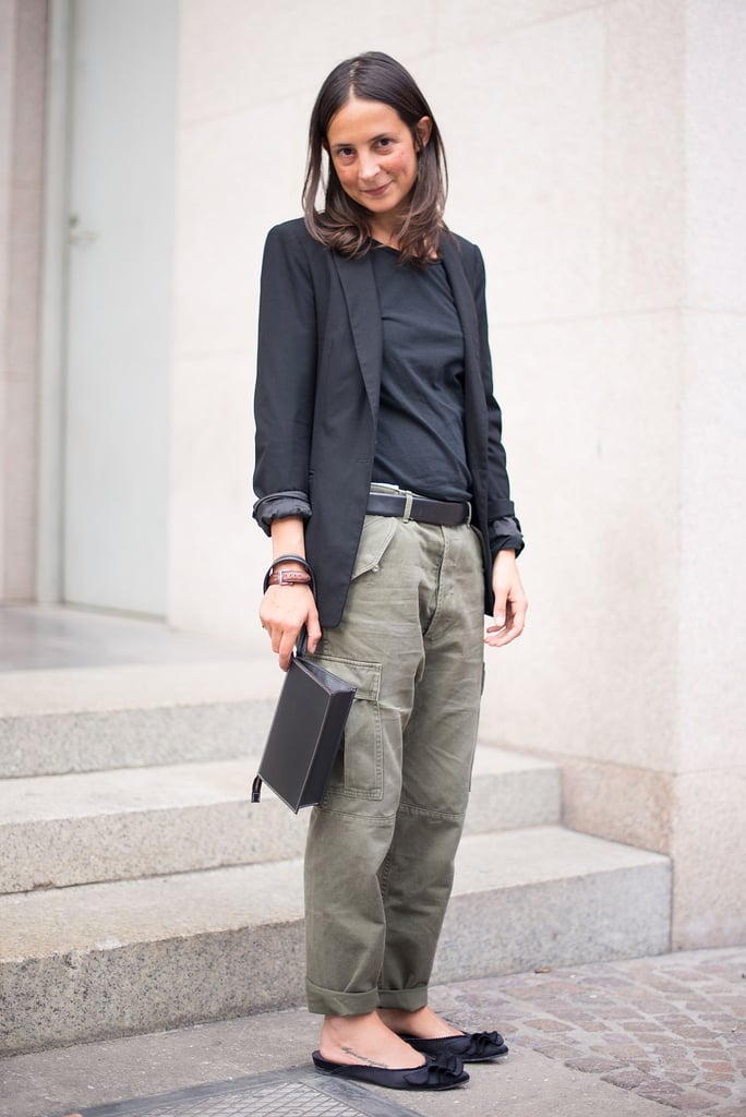 This take-your-cargo-pants-to-work look relies on understated separates, simple, functional footwear, and a blazer to tie it all together.