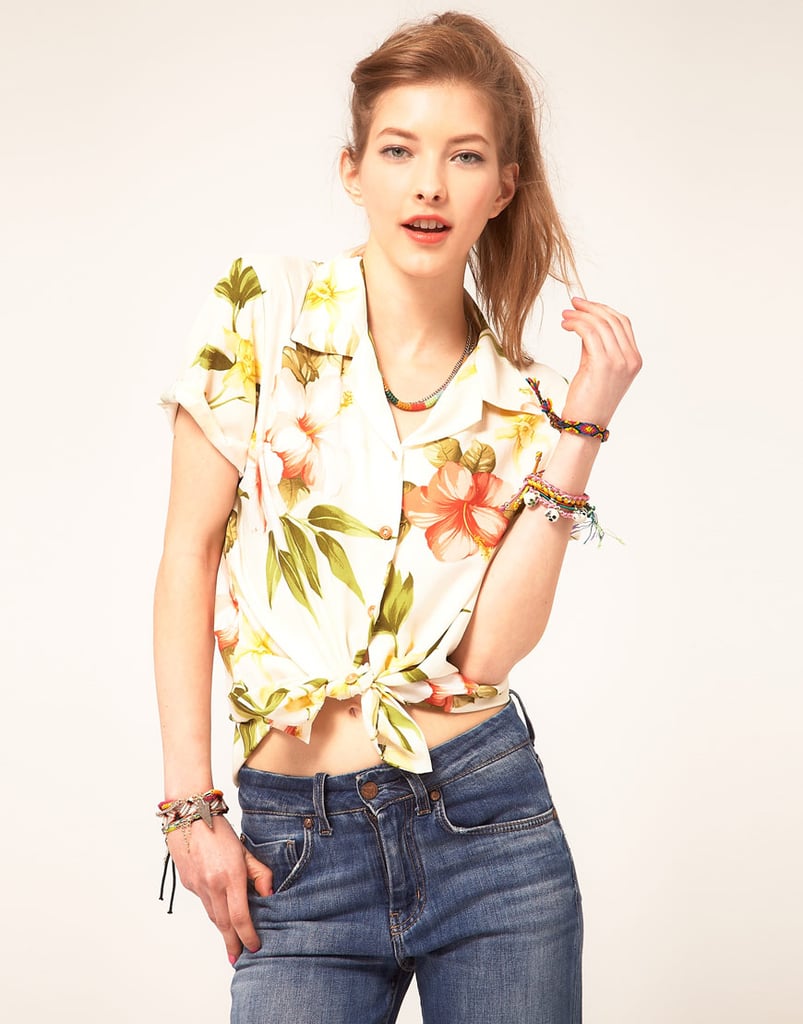 For a playful take on a Hawaiian print, try a cropped tie-front blouse. The Summer-perfect shape will give the bold floral style an added punch of cool.
Paradise Found Hibiscus Summer Hawaiian Shirt ($148)
For a playful take on a Hawaiian print, try a cropped tie-front blouse. The Summer-perfect shape will give the bold floral style an added punch of cool.
Paradise Found Hibiscus Summer Hawaiian Shirt ($148)