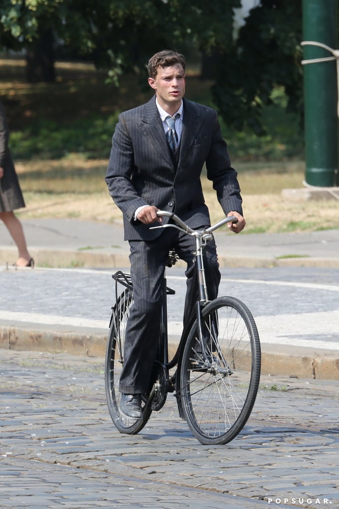 Riding a Bike in a Suit