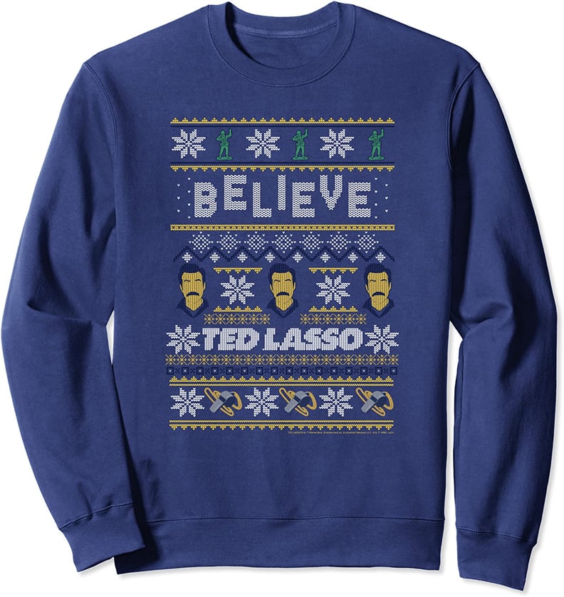 For Getting Into the Holiday Spirit: "Ted Lasso" Christmas Believe Ugly Sweater
