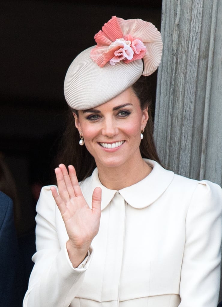 Kate added a flash of pretty pink with her hat at the reception at the Grand Place in Belgium in 2014.