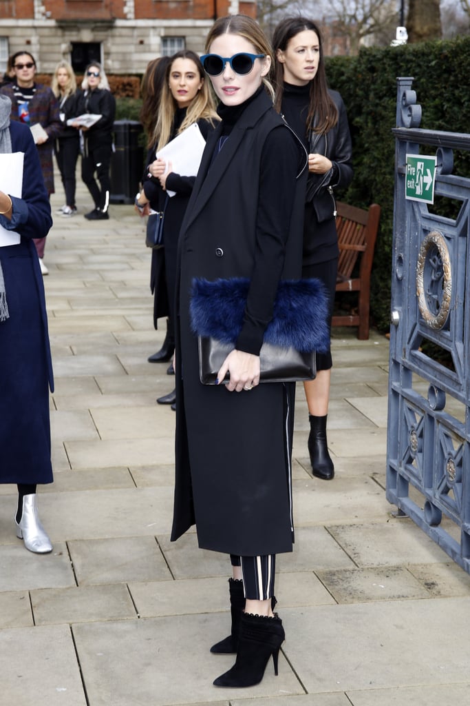 Olivia switched into striped pants, a tuxedo jacket, and added a textured clutch for intrigue. Olivia switched into striped pants, a tuxedo jacket, and added a textured clutch for intrigue.