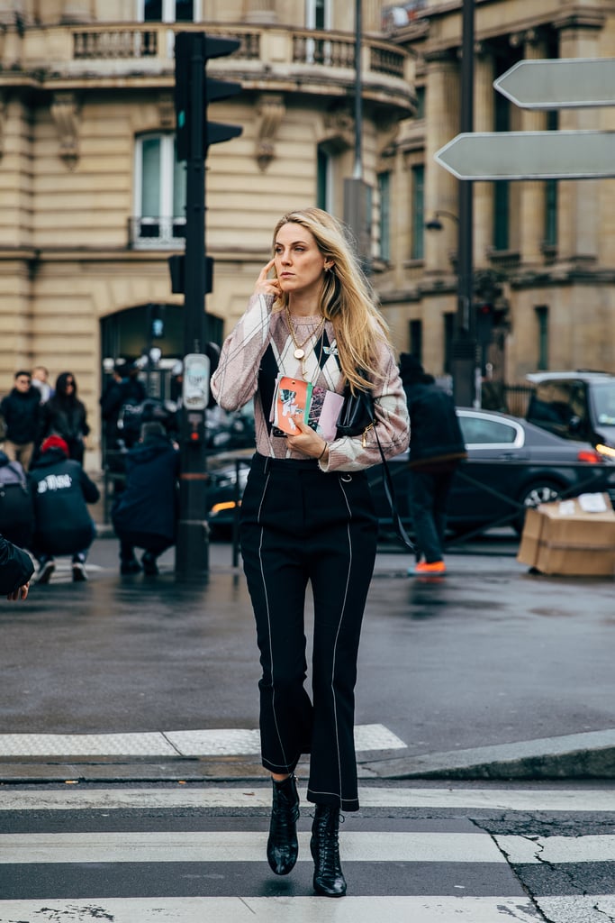 Style an argyle sweater with jeans and black boots.