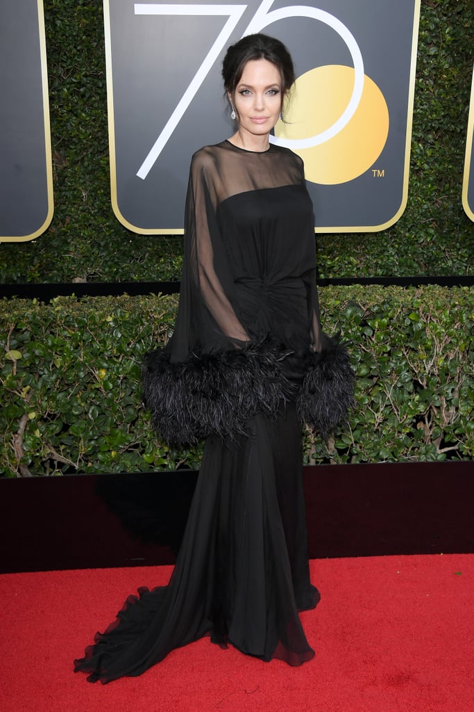 All eyes on Angelina Jolie's sleeves, please (she wore an Atelier Versace gown).