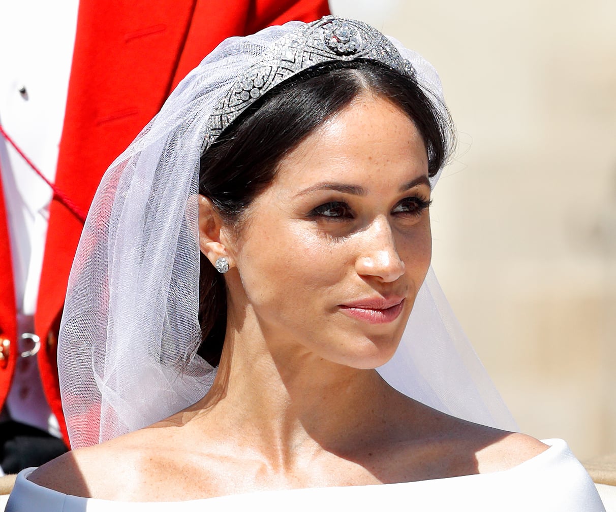 WINDSOR, UNITED KINGDOM - MAY 19: (EMBARGOED FOR PUBLICATION IN UK NEWSPAPERS UNTIL 24 HOURS AFTER CREATE DATE AND TIME) Meghan, Duchess of Sussex travels in an Ascot Landau carriage as she & Prince Harry, Duke of Sussex begin their procession through Windsor following their wedding at St George's Chapel, Windsor Castle on May 19, 2018 in Windsor, England. Prince Henry Charles Albert David of Wales marries Ms. Meghan Markle in a service at St George's Chapel inside the grounds of Windsor Castle. Among the guests were 2200 members of the public, the royal family and Ms. Markle's Mother Doria Ragland. (Photo by Max Mumby/Indigo/Getty Images)