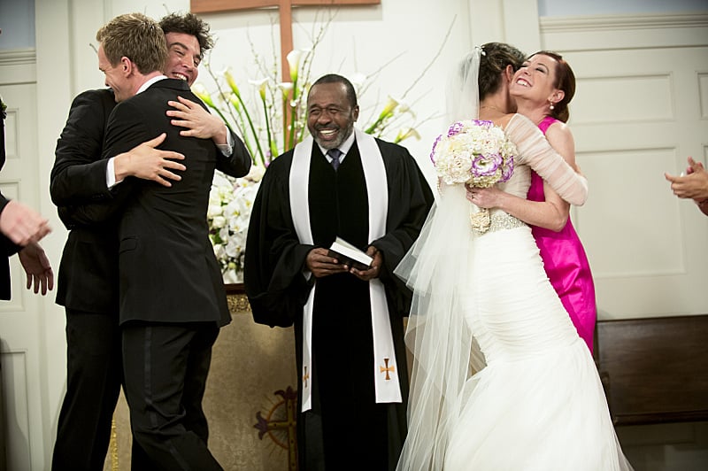 The bride and groom embrace their friends after the pronouncement.