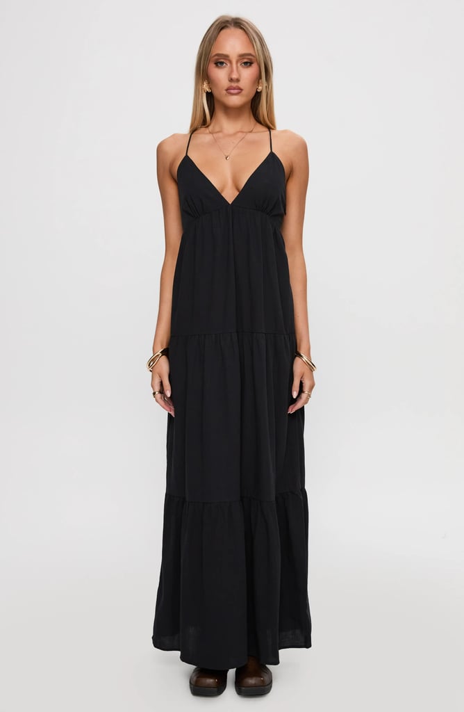 Princess Polly Chelsea Tiered Lace-Up Back Maxi Dress ($38, originally $75)
During hot summer months you can't go wrong with a little black maxi dress. The tiered design allows for an airy, weightless feel (essential for staying cool), while the triangle top still feels festive for a night out.