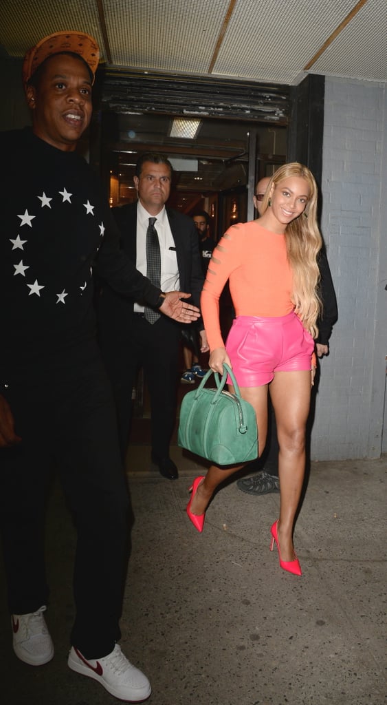 Beyoncé brought the wow factor in sherbet-colored separates, while JAY-Z played it cool in black and white.