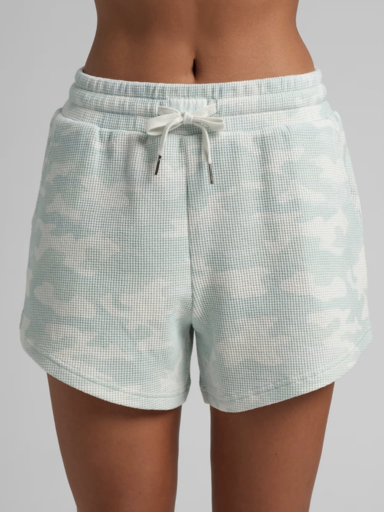 Comfrt Waffle Lounge Short ($39, originally $55)
Sometimes sweatpants and fleece shorts can just be too heavy — especially in the summer. Instead, opt for a more universal fabric, like these waffle lounge shorts. The drawstring waistband will prevent the bottoms from feeling too tight around your stomach, while the extra flowy shape will ensure maximum comfort.