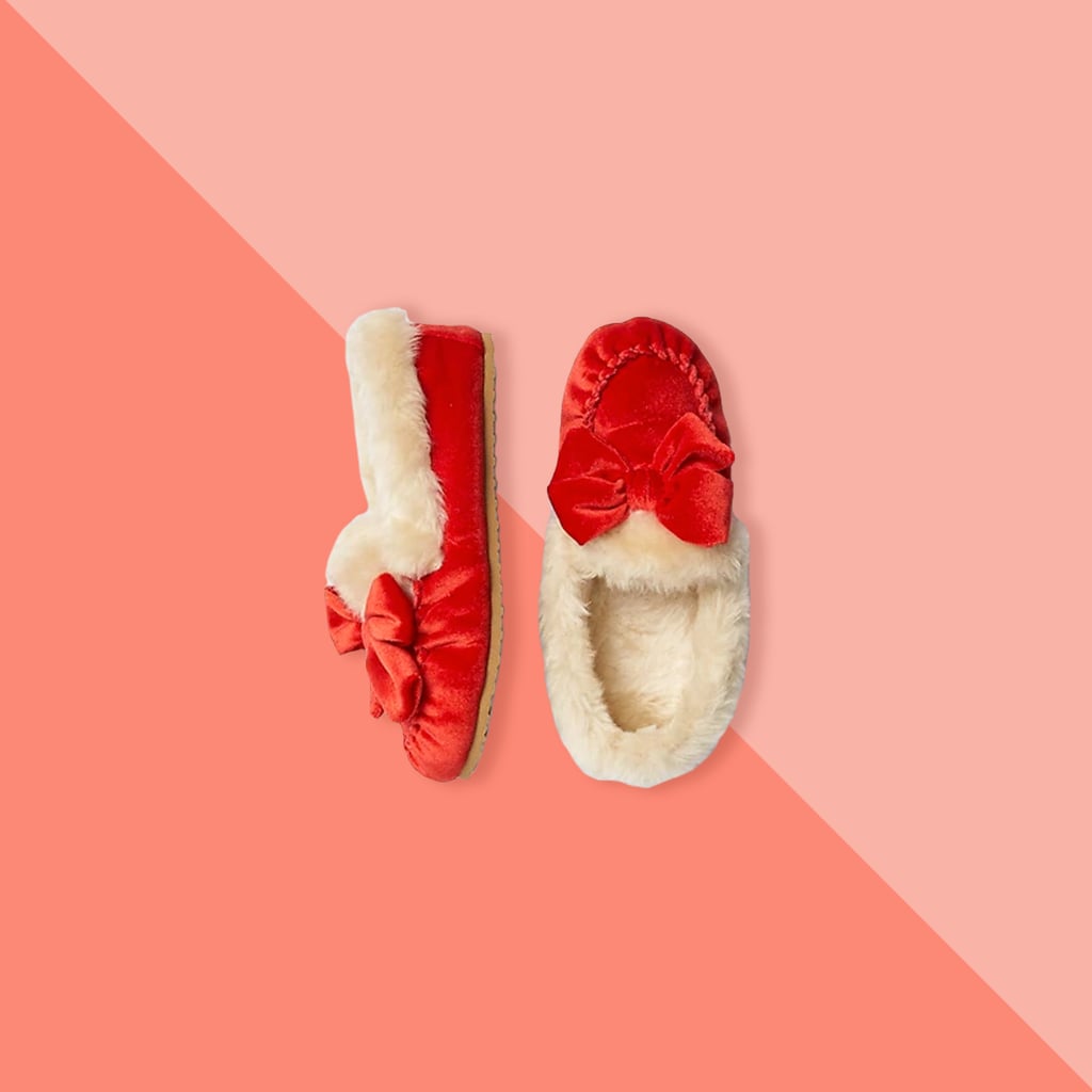 With the rich red hue, supersoft velvet and faux fur textures, and adorable bow, these slippers ($35) will keep her feet cute and warm.