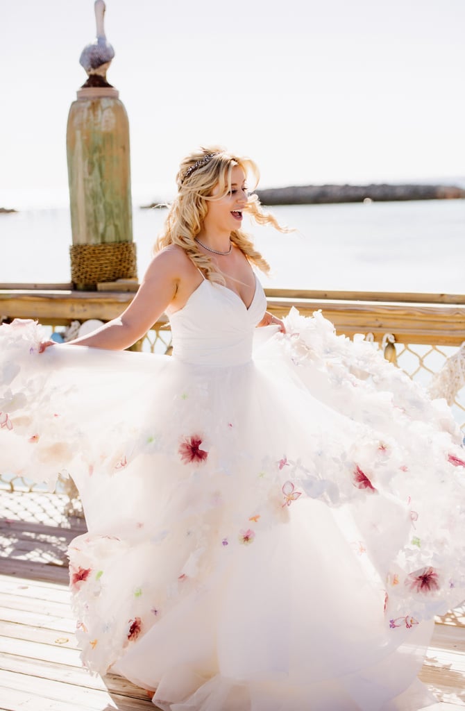 Colette (fittingly) wore a white princess gown, embellished with pastel colored flowers and butterflies.