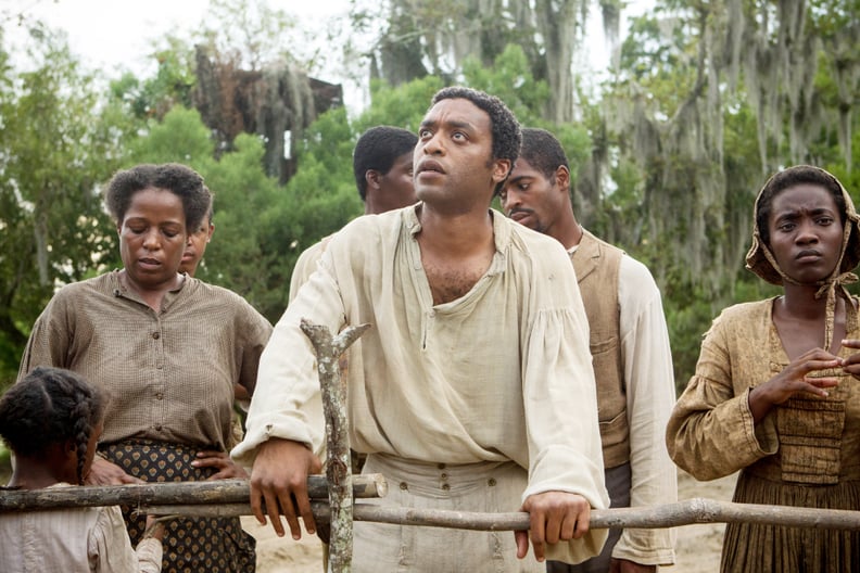 12 YEARS A SLAVE, Chiwetel Ejiofor (center), 2013. ph: Jaap Buitendijk/TM and Copyright Fox Searchlight Pictures. All rights reserved./courtesy Everett Collection