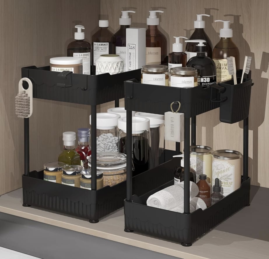 Sevenblue Under Sink Organizer ($14, originally $22)
Keep your things out of sight and out of mind with this under-the-sink storage. It can hold things like extra shampoo and conditioner, shower cleaning products, soap, and more. There are also functional side hooks attached that make it easy to maximize on space and store extra products.