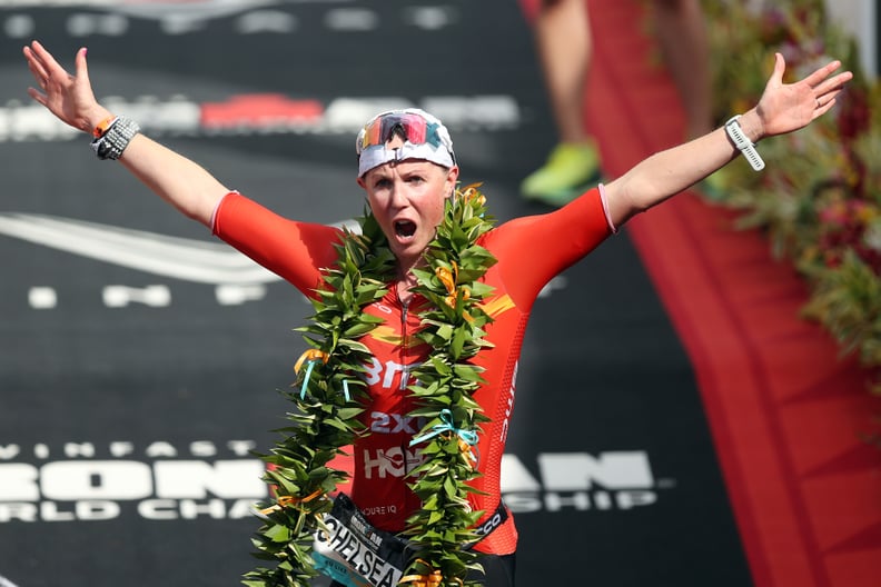 KAILUA KONA, HAWAII - OCTOBER 06: Chelsea Sodaro celebrates after winning the Ironman World Championships on October 06, 2022 in Kailua Kona, Hawaii. (Photo by Ezra Shaw/Getty Images for IRONMAN)