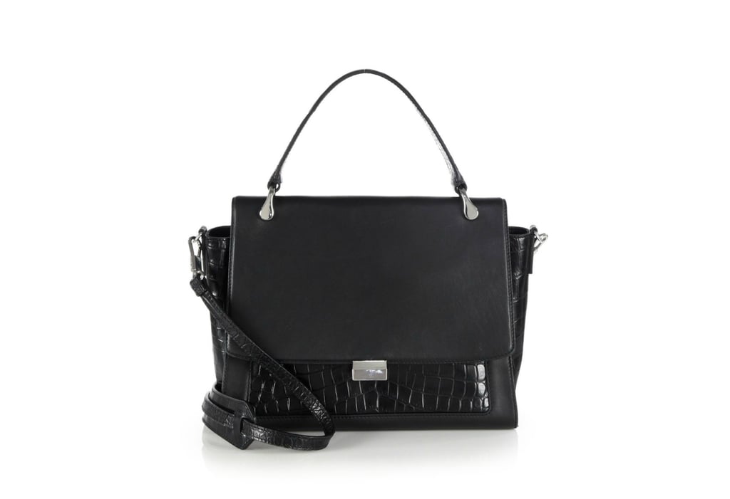 OK, here's the splurge: Elizabeth and James's Charlie Smooth Leather and Crocodile-Embossed Leather Satchel ($645). But is it worth it? We say yes!