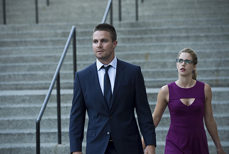 Stephen Amell as Oliver Queen and Emily Bett Rickards as Felicity Smoak.