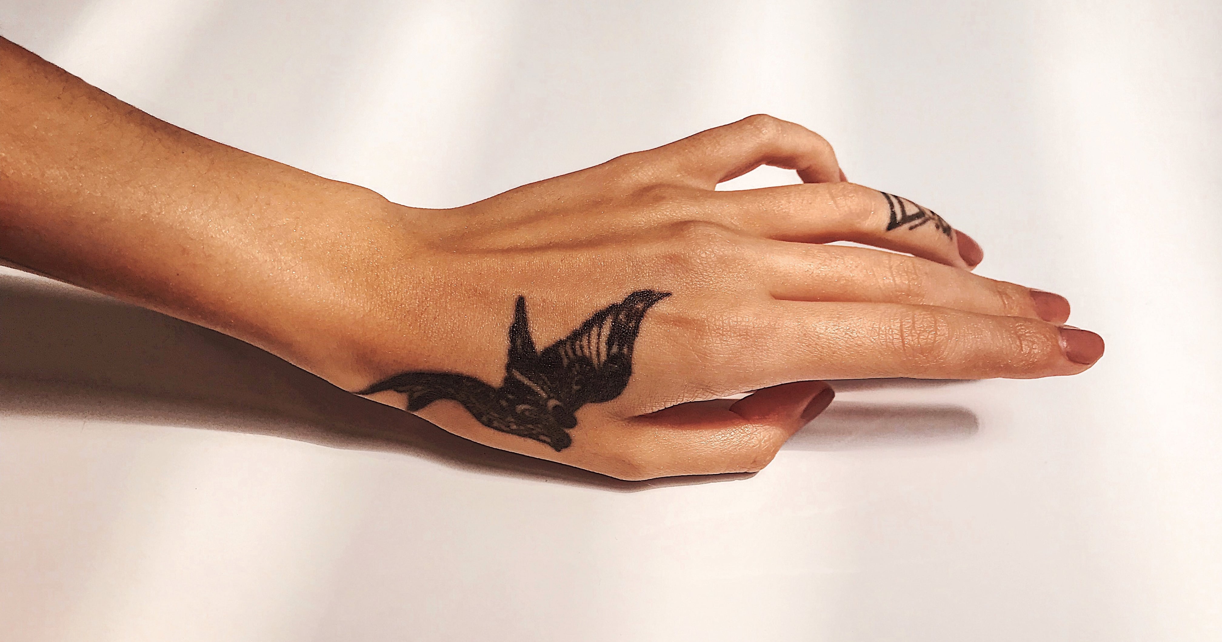 Tattoo Removal 101: How It Works, Cost, & Before and Afters