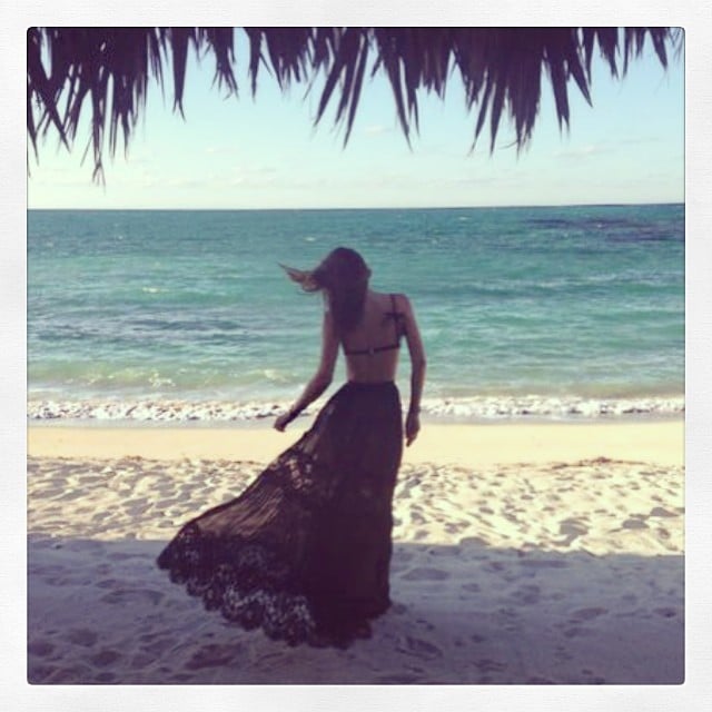 Miranda Kerr walked in the sand. 
Source: Instagram user mirandakerr