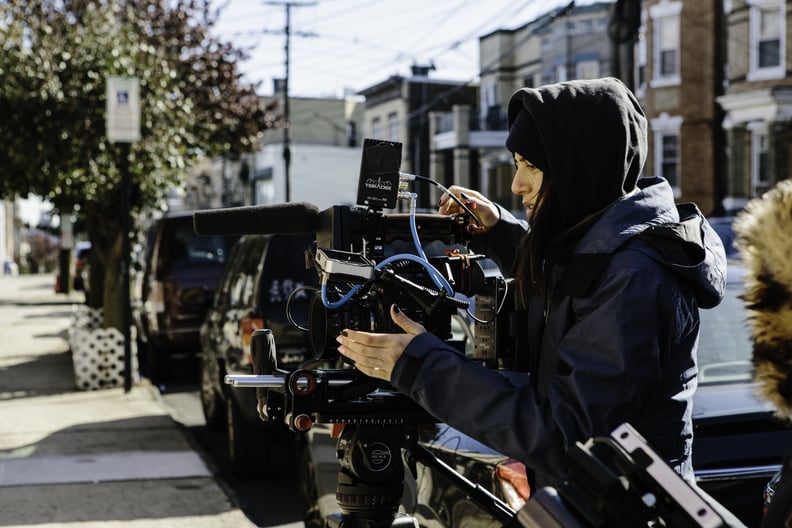 The crew shoots outside Shake's house