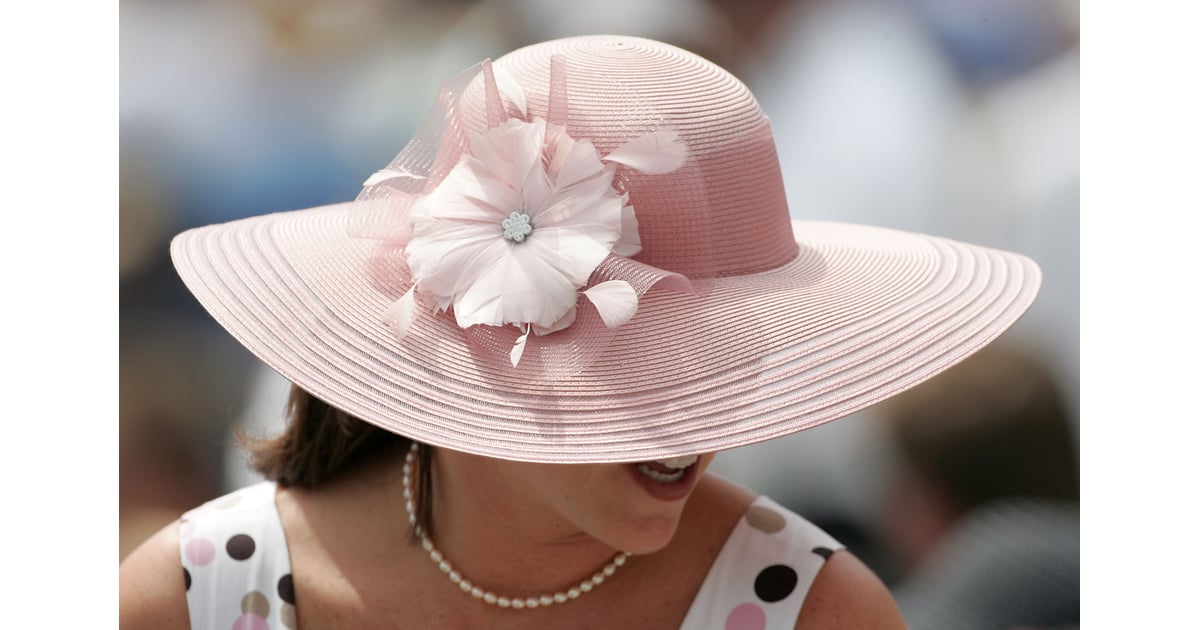 grandstand wearing her light-pink hat 
