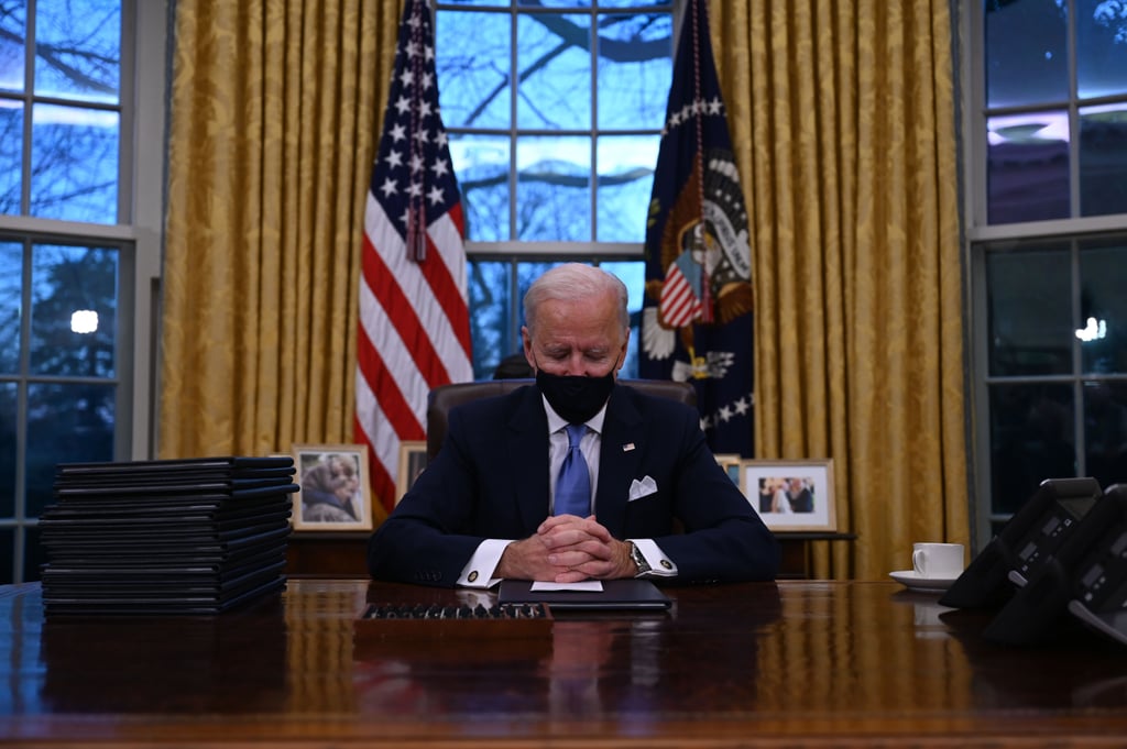 Biden Seated at the Resolute Desk