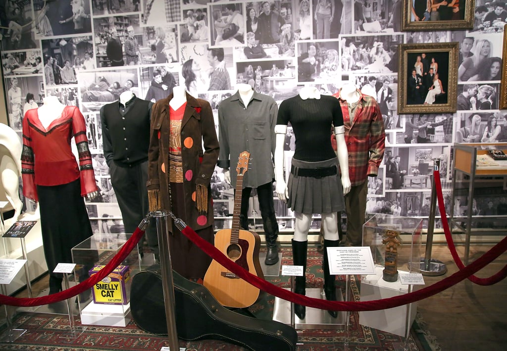 Some of the most iconic costumes from the show (including Phoebe's guitar!) are on display at Central Perk.