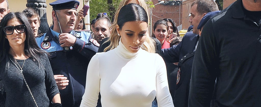 Kim Kardashian With Cutout of Rob Kardashian's Face