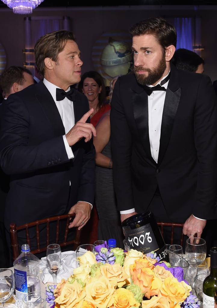 Brad Pitt looked like he was teaching John Krasinski a thing or two.