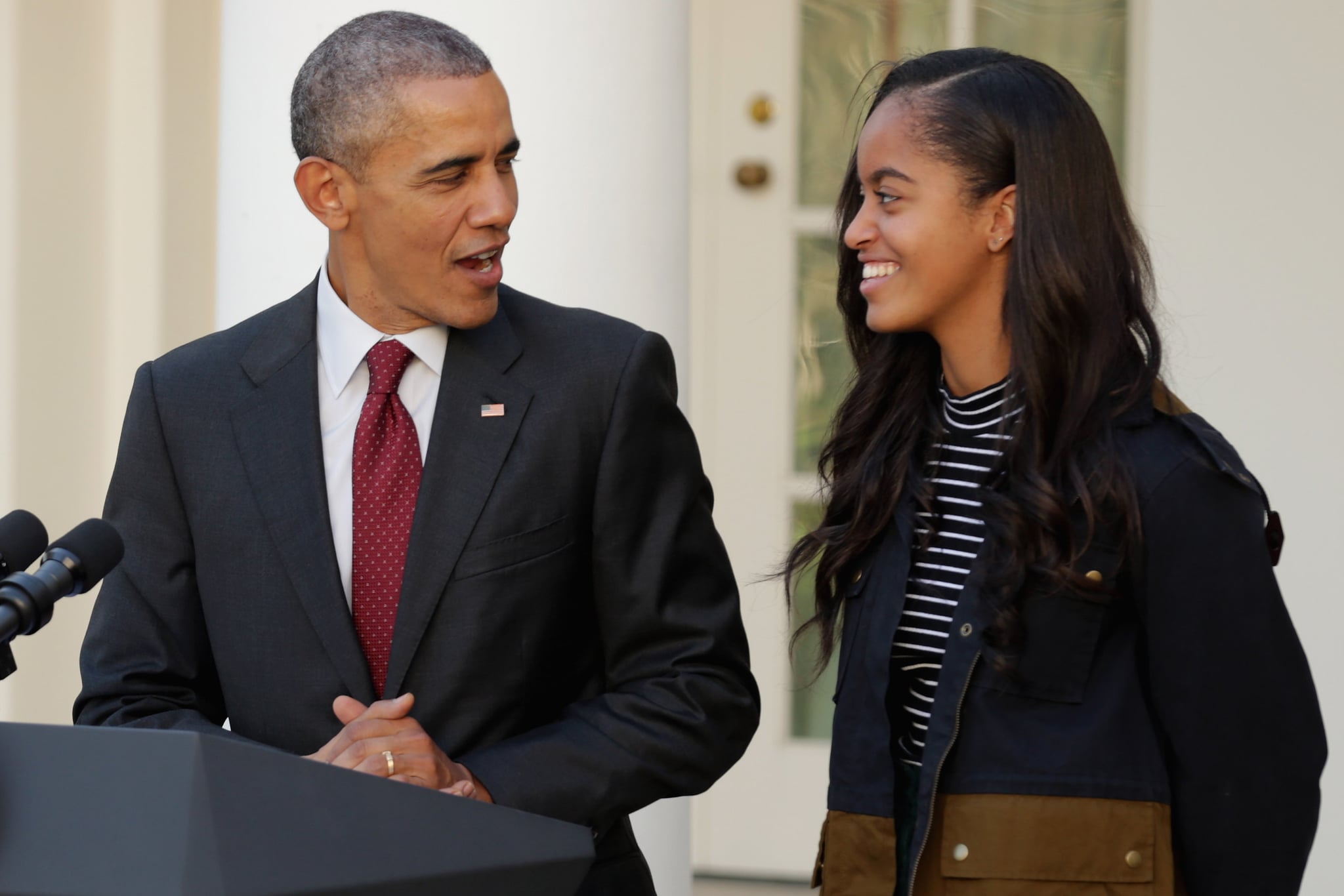 WASHINGTON, DC - NOVEMBER 25:  U.S. President Barack Obama (L) delivers remarks with his daughter Malia during the annual turkey pardoning ceremony in the Rose Garden at the White House  November 25, 2015 in Washington, DC. In a tradition dating back to 1947, the president pardons a turkey, sparing the tom -- and his alternate -- from becoming a Thanksgiving Day feast. This year, Americans were asked to choose which of two turkeys would be pardoned and to cast their votes on Twitter.  (Photo by Chip Somodevilla/Getty Images)