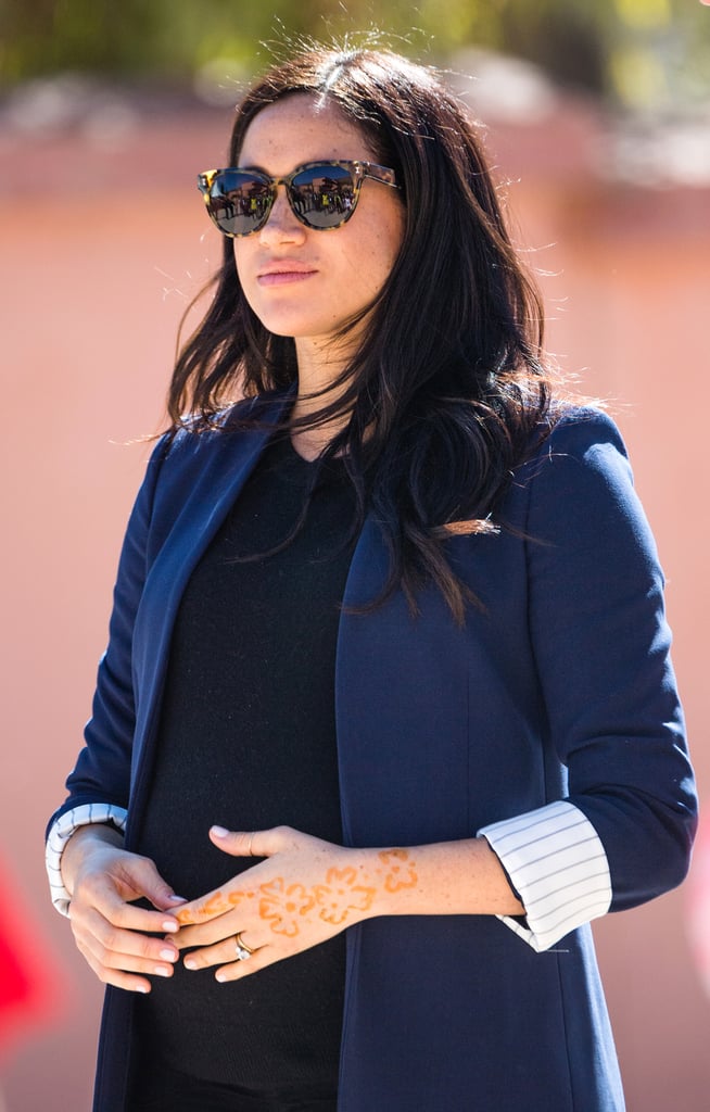 Meghan in a Navy Blazer With Striped Cuffs