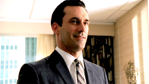 Don Draper can switch gears and be smiley.