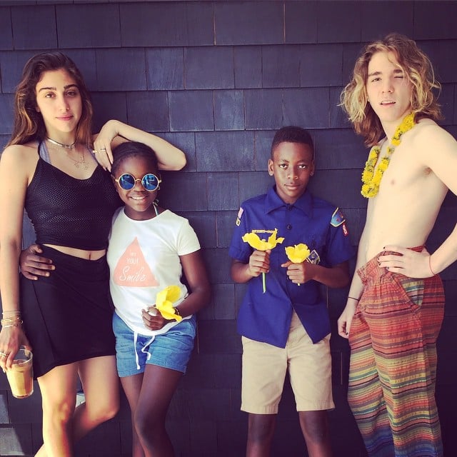 Madonna considers herself the "luckiest mom in the world" and shared a fun photo of all four of her kids.