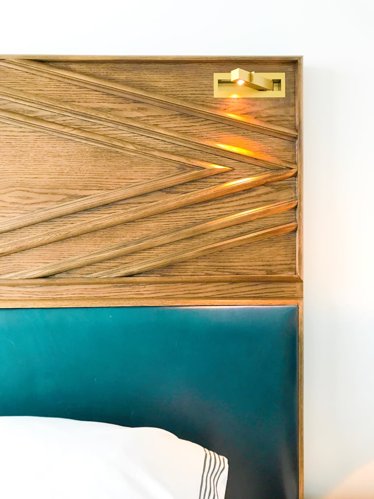 Hidden lights in the headboard are perfect for late-night reading.