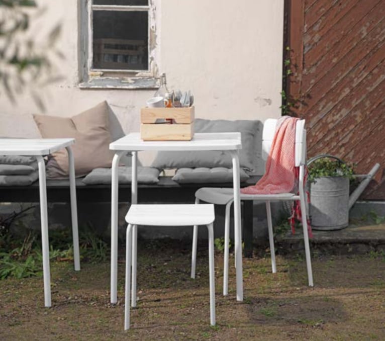 The powder-coated steel and plastic Väddö table ($49) and chairs ($15) are great for a small backyard because they can be folded or stacked when not in use.