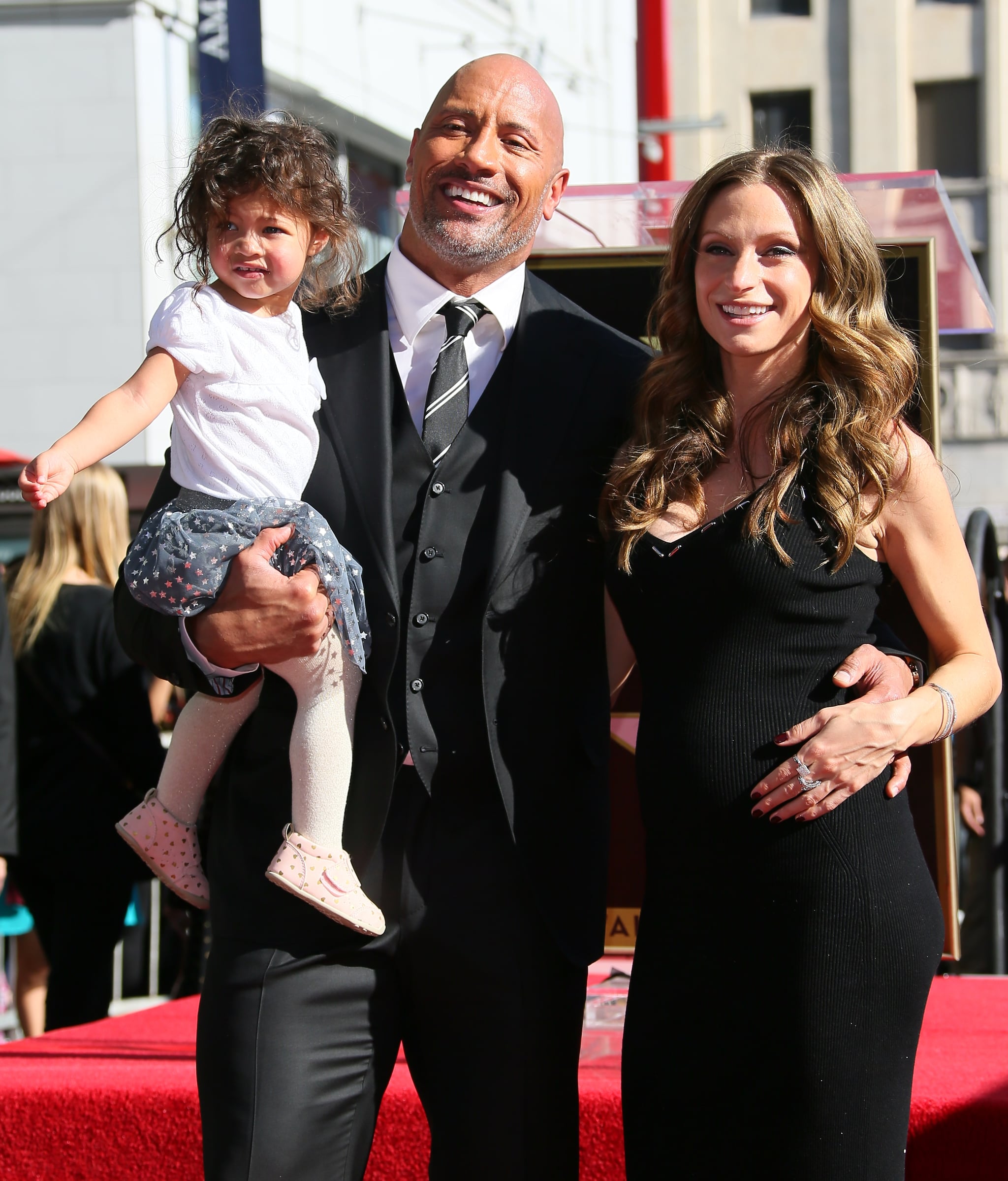 LOS ANGELES, CA - DECEMBER 13: Dwayne Johnson, Lauren Hashian and daughter Jasmine Johnson attend a ceremony honoring him with a star on The Hollywood Walk of Fame on December 13, 2017 in Los Angeles, California. (Photo by JB Lacroix/ WireImage)
