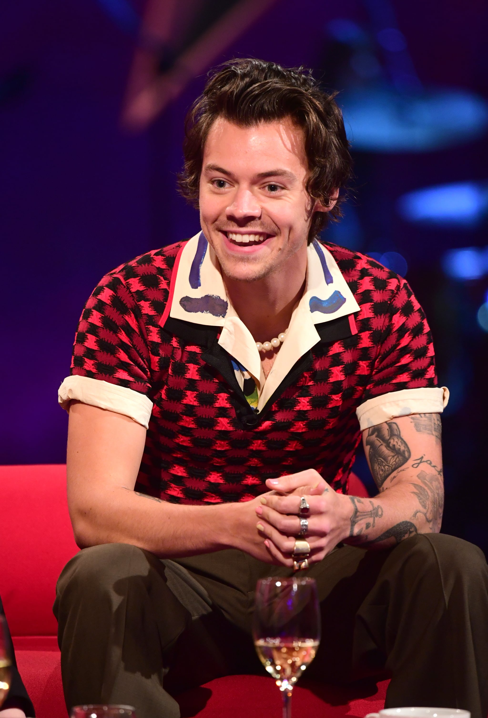 Pictures Of Harry Styles Smiling And Laughing Popsugar Celebrity