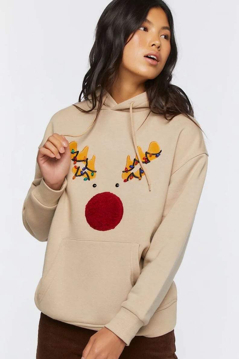 一个驯鹿运动衫:Forever 21驯鹿绣花图形连帽衫