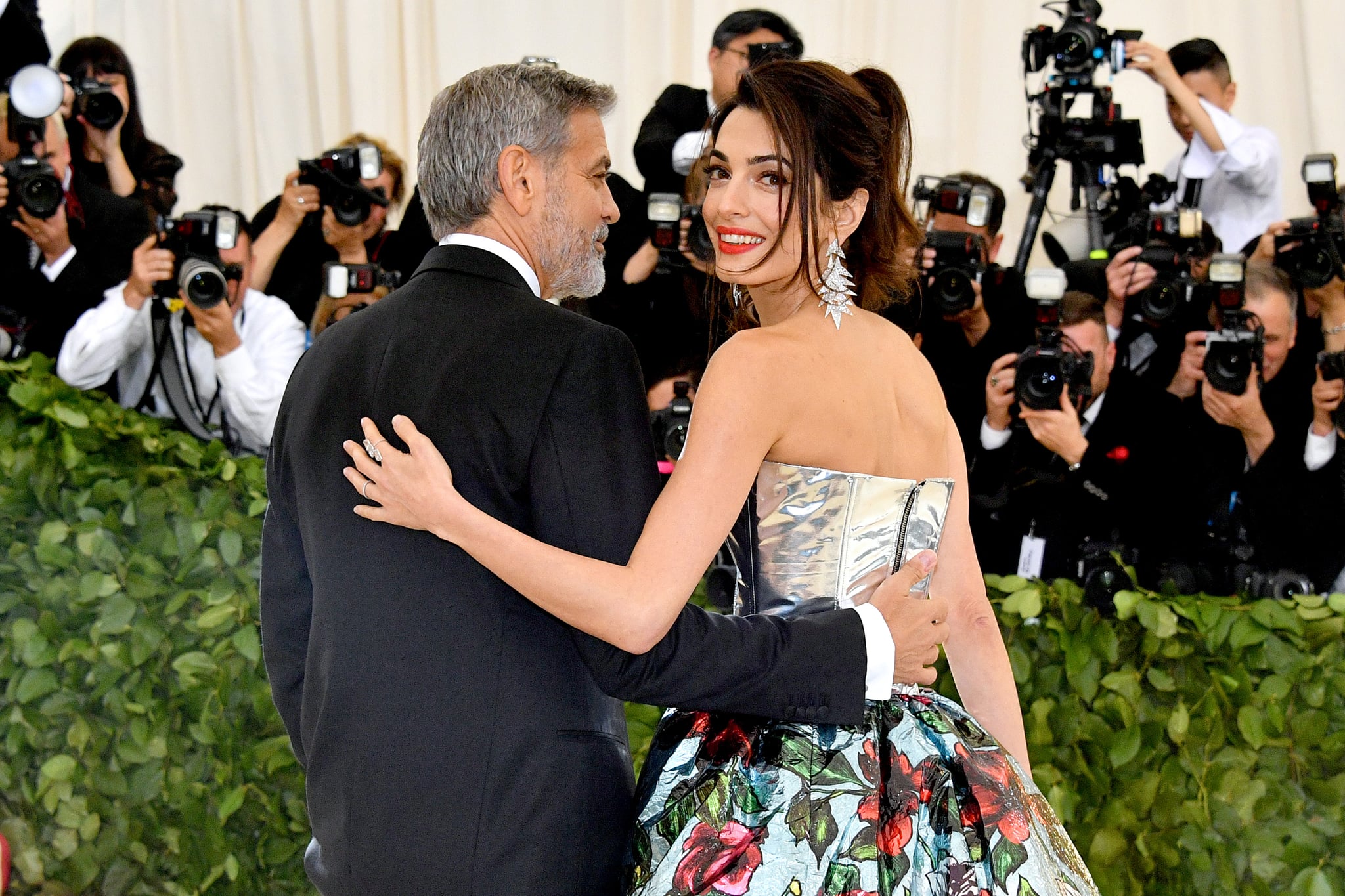 NEW YORK, NY - MAY 07:  George Clooney (L) and Amal Clooney attend the Heavenly Bodies: Fashion & The Catholic Imagination Costume Institute Gala at The Metropolitan Museum of Art on May 7, 2018 in New York City.  (Photo by Dia Dipasupil/WireImage)