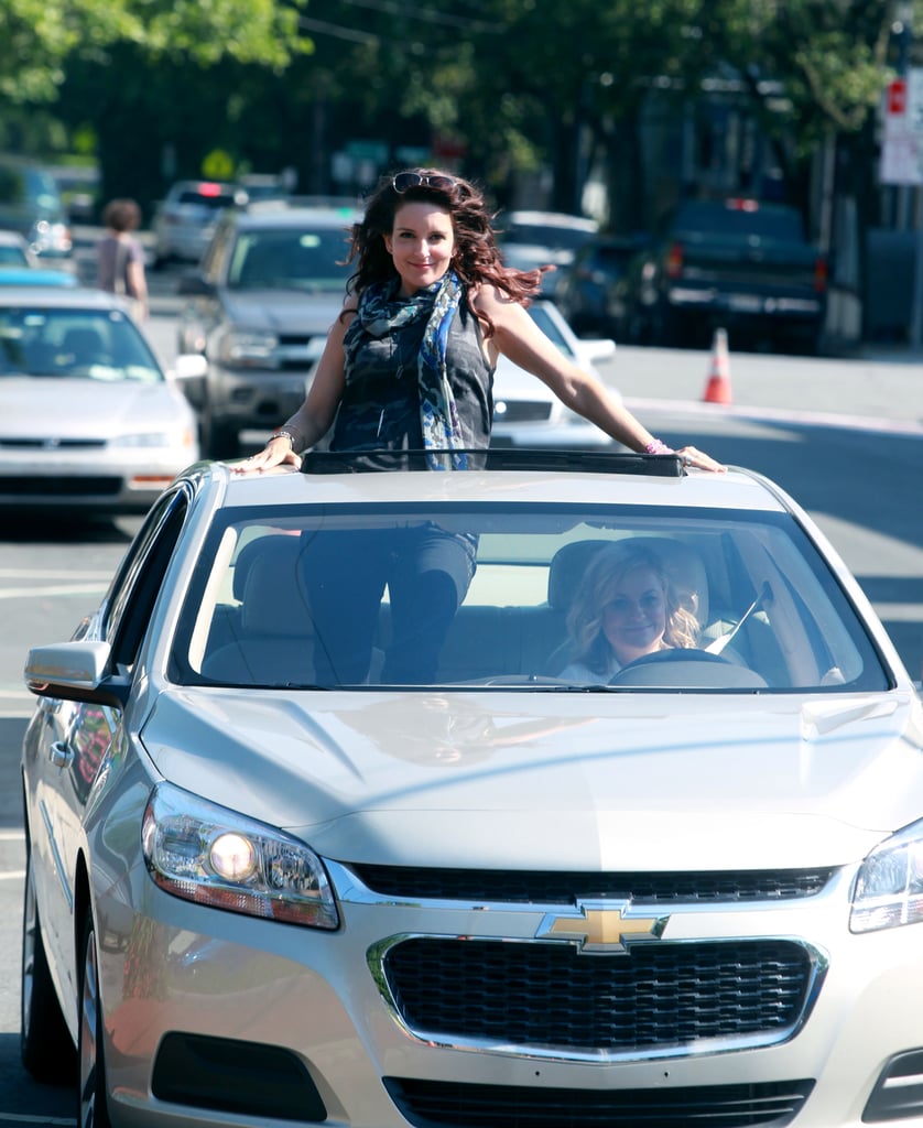 Tina struck a sassy pose when filming took over the street.