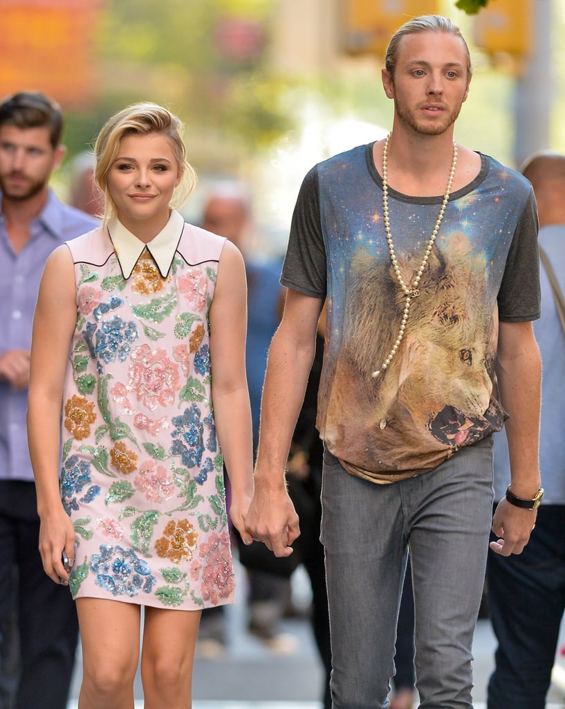 Chloë Moretz held onto her brother Trevor's hand while walking around NYC on Monday.